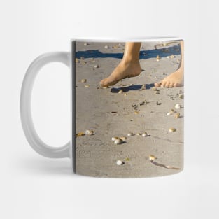 Toes and sea-shells on the sand Mug